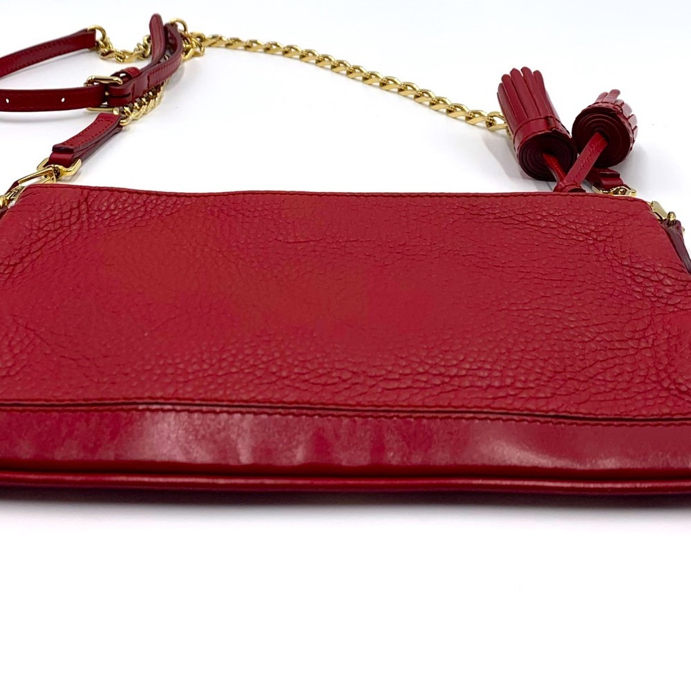 Auth Burberry Peyton Crossbody Clutch with Tassel in Rich Cranberry Red. $485 - Picture 5 of 13